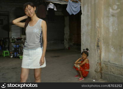 Daily life in China a young model poses for the camera.