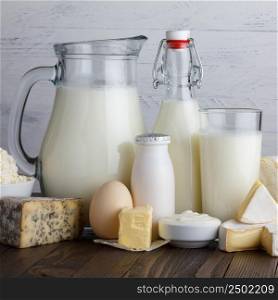 Dairy products on wooden table