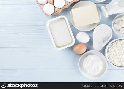 Dairy products on wooden table. Dairy products on wooden table, top view