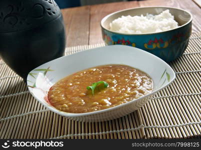Dal bhat - traditional meal Nepal, Bangladesh and India.consists of steamed rice and a cooked lentil soup called dal.