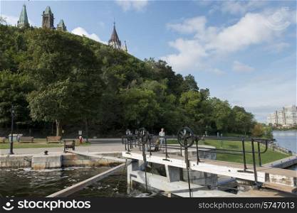 Dam on Rideau Canal with Parliament Building in the background, Parliament Hill, Ottawa, Ontario, Canada