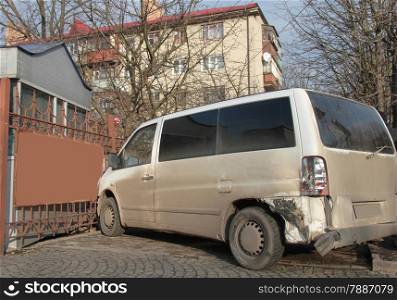 Damaged minibus after a street accident