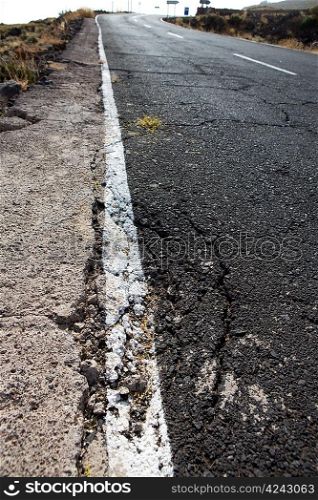 Damaged road grunge paint weathered in Canary Islands