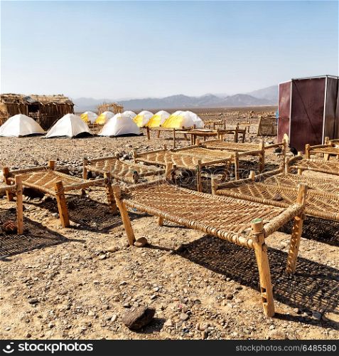 danakil ethiopia africa in the national park camping for tourist and typical oitside wooden bed made of wicker . ethiopia africa in the national park camping for tourist