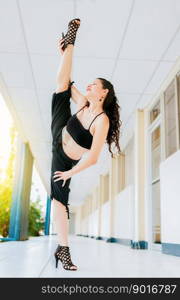 Dance artist woman doing acrobatics and flexibilities in heels. Artistic gymnastics concept, Dance girl doing flexibility in high heels. Woman dancer in heels doing yoga flexibilities