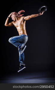 Dancer dancing in the dark studio