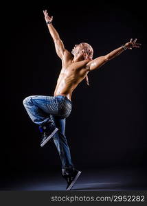 Dancer dancing in the dark studio