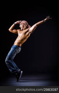 Dancer dancing in the dark studio