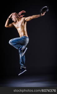 Dancer dancing in the dark studio