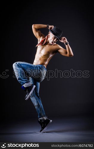 Dancer dancing in the dark studio