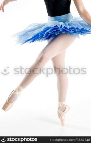 dancer i blue tutu dancing in pointe