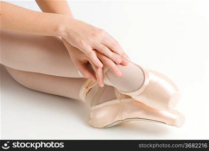 dancer in ballet shoes dancing in pointe