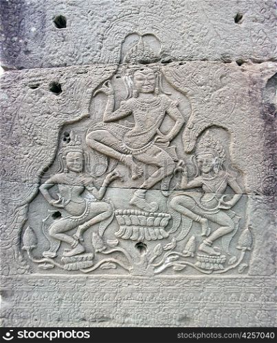 Dancing apsara on the wall in temple Prasat Bayon in Angkor complex, Siem Reap, Cambodia