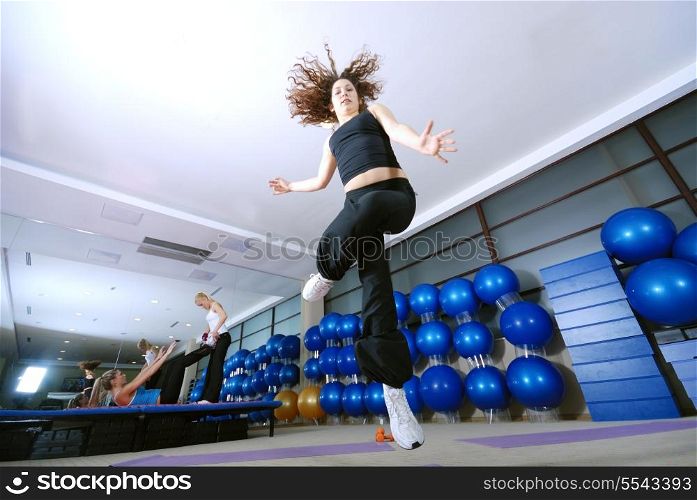 Dancing woman, happy and jumping up.
