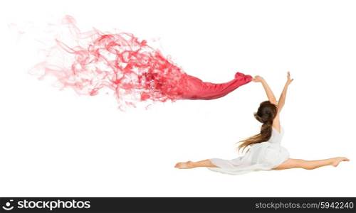 Dancing young girl with red cloth isolated