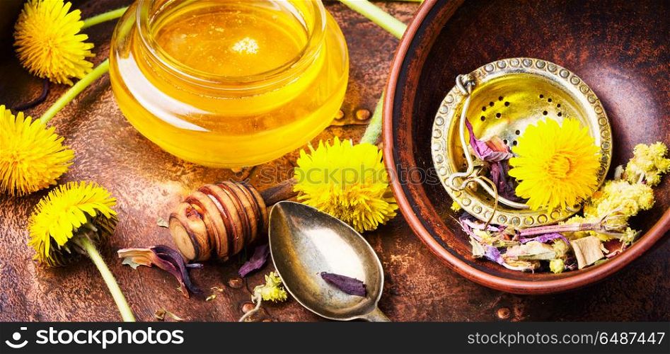 Dandelion honey in jar. Honey from blossoming spring dandelions, as a medicine