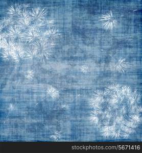 Dandelions over blue, grunge background