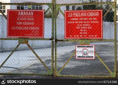 Danger sign on the gate in Melaka