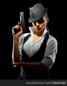 Dangerous and beautiful criminal girl with gun isolated