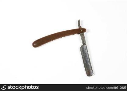 dangerous vintage shaving blade on white isolated background