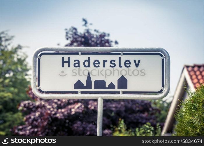 Danish city sign of Haderslev in the summer