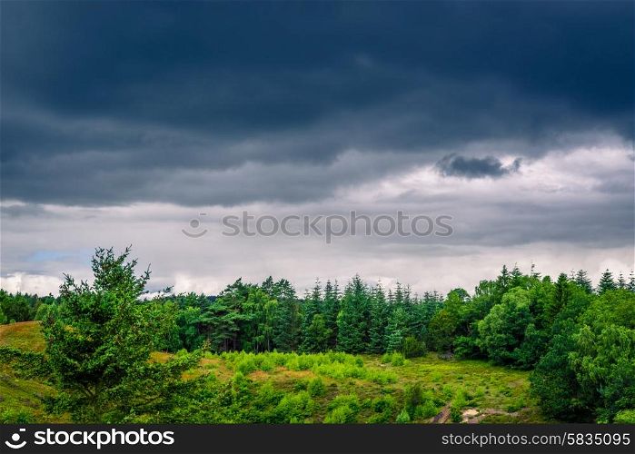 Danish Landscape with dark clouds in the summer