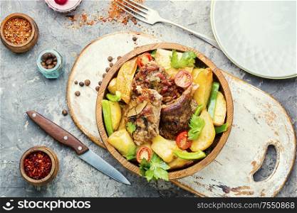 Danish meat baked with new potatoes.Roasted meat. Baked meat with potatoes