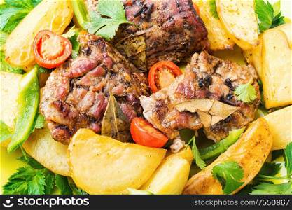 Danish meat baked with new potatoes.Roasted meat. Grilled meat and potatoes