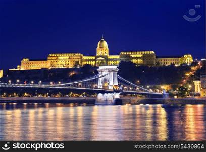 Danube river, Chain Bridge and Buda Castle (Royal Palace) at night. Budapest, Hungary.