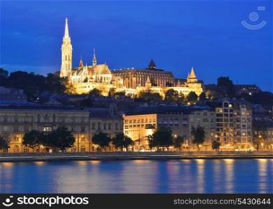 Danube river, Matthias Church and Fisherman&rsquo;s Bastion at night against a dark blue sky. Budapest, Hungary.