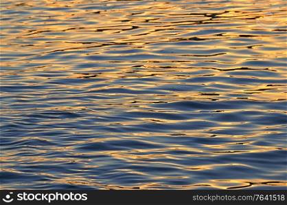 Danube river waves at sunset in Galati, Romania