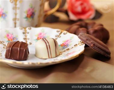 dark and white chocolate candies on a plate