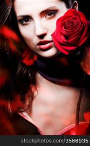 dark beautiful woman with red rose