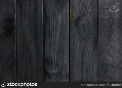 Dark black rustic wooden background