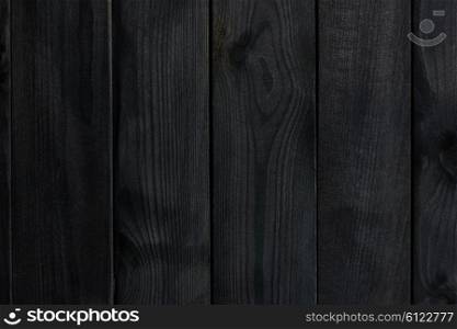 Dark black rustic wooden background