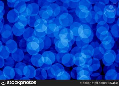Dark blue Blurred lights background. Defocused glitter background. Dark blue Blurred lights background