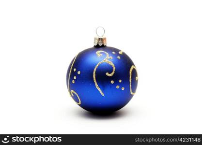 Dark blue christmas ball with gold pattern isolated on white background.