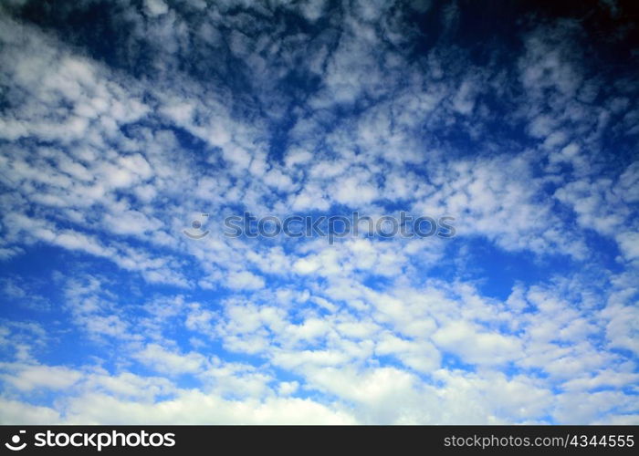 Dark-blue sky with little clouds on it