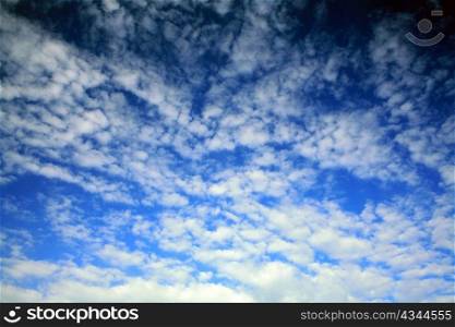 Dark-blue sky with little clouds on it