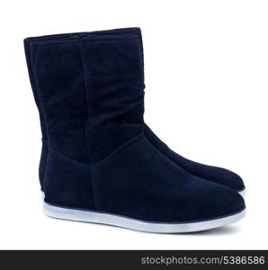 Dark blue suede boots isolated on white