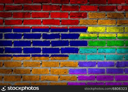 Dark brick wall texture - coutry flag and rainbow flag painted on wall - Armenia