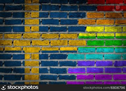 Dark brick wall texture - coutry flag and rainbow flag painted on wall - Sweden