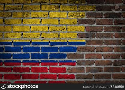 Dark brick wall texture - flag painted on wall - Colombia