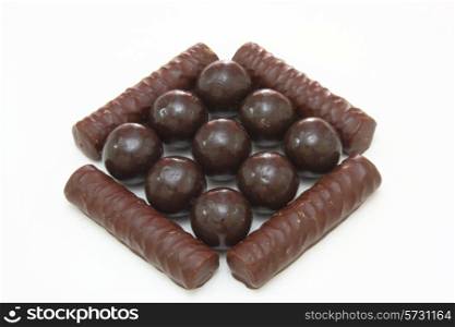 Dark brown Chocolate balls on white background