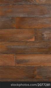 Dark brown textured wooden background from horizontal planks with knots and texture. Vertical image.. Beautiful wall of dark brown wooden planks, vertical image, texture and background.