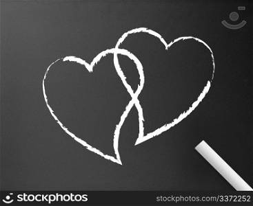 Dark chalkboard background with two hearts illustration.
