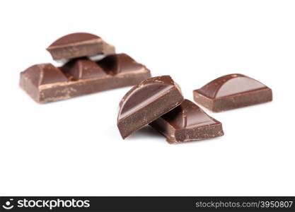 Dark chocolate bars on a white background