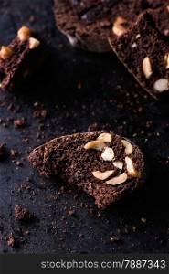 Dark chocolate biscotti with nuts, selective focus