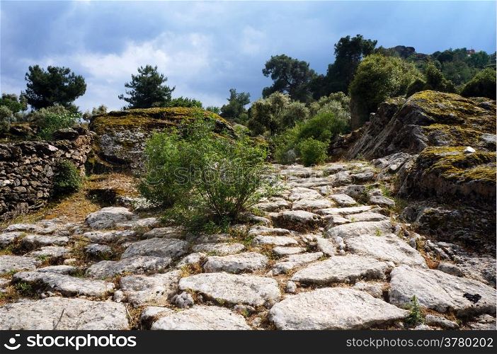 Dark clouds and ancient road in Turkey