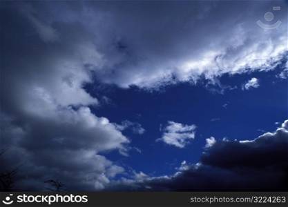 Dark Clouds In A Blue Sky
